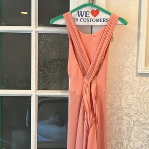 Pink backless dress with linings inside bought it at Bloomingdale’s.